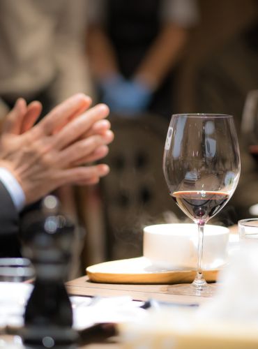 Guests enjoying corporate Greek wine tasting in Athens