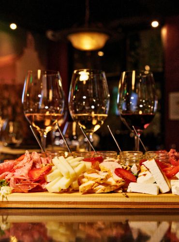 Greek wine and food pairing experience in Athens with cheese and charcuterie