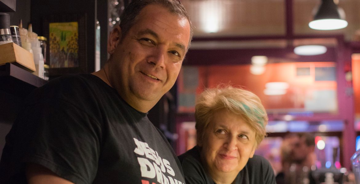 Grigoris and Evangelia of Cinque Wine and Deli behind Casa Cinque Wine Escape