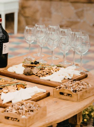 Curated Greek wine tasting plan with wine glasses and tasting notes